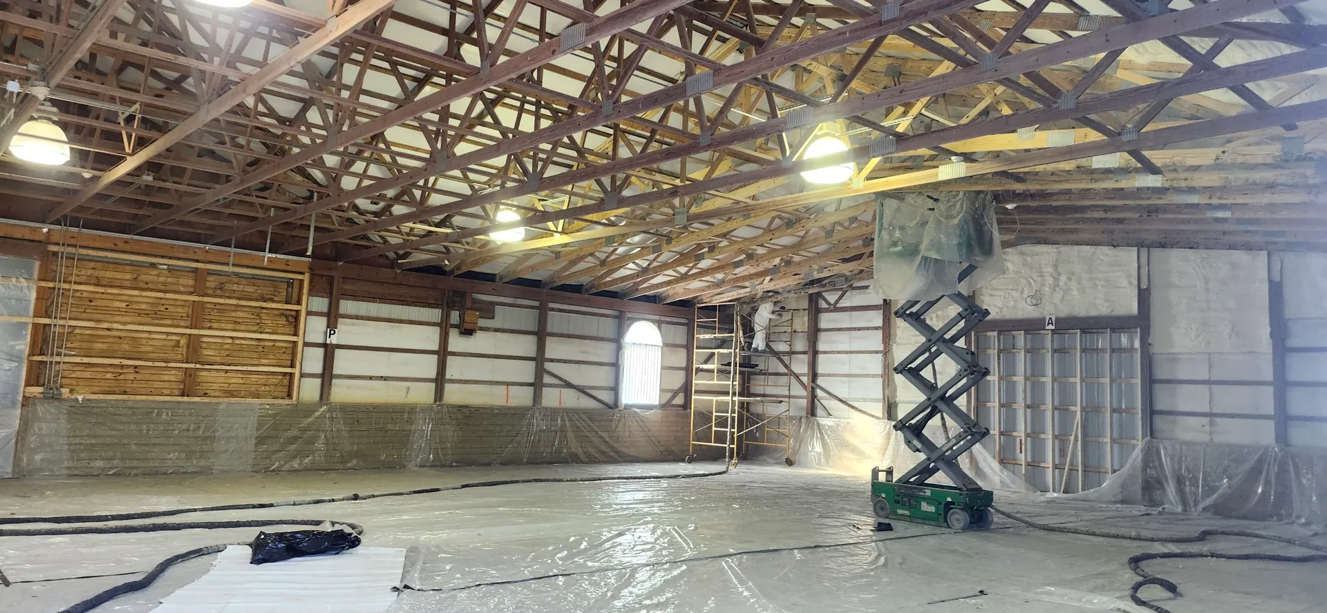 Commercial building with steel trusses and spray foam ceiling