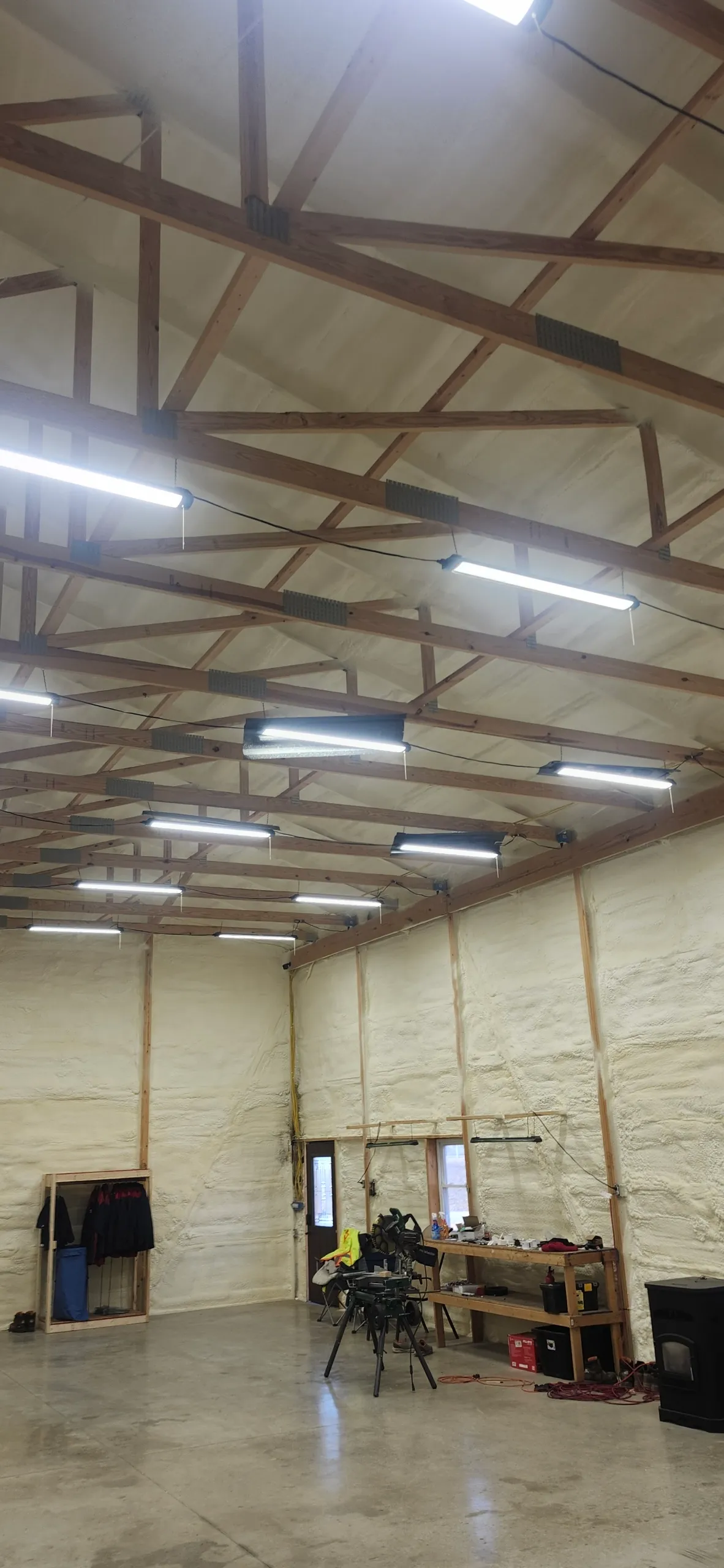 Completed pole barn interior with full spray foam coverage