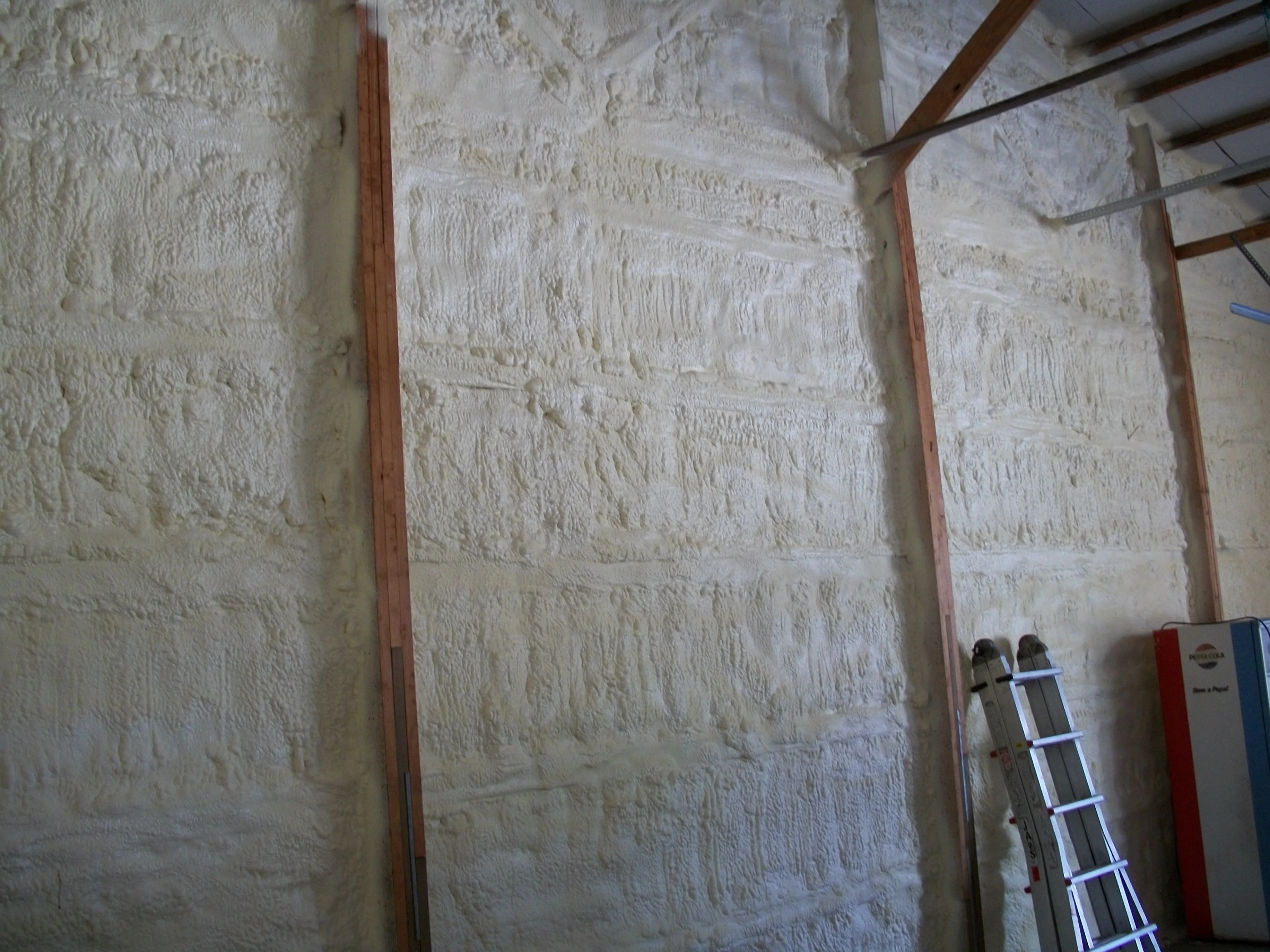 Pole barn wall insulation with closed-cell foam