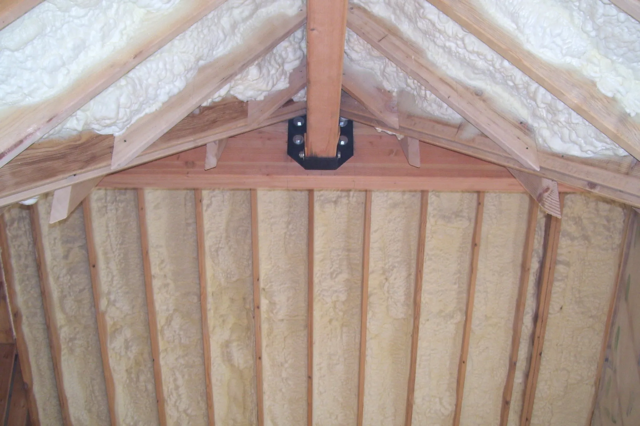 Post-and-beam gable end spray foam insulation