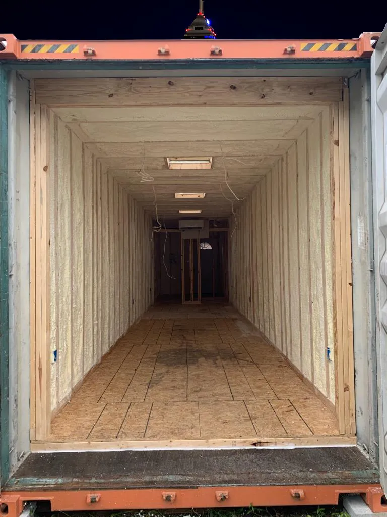 Shipping container interior spray foam insulation